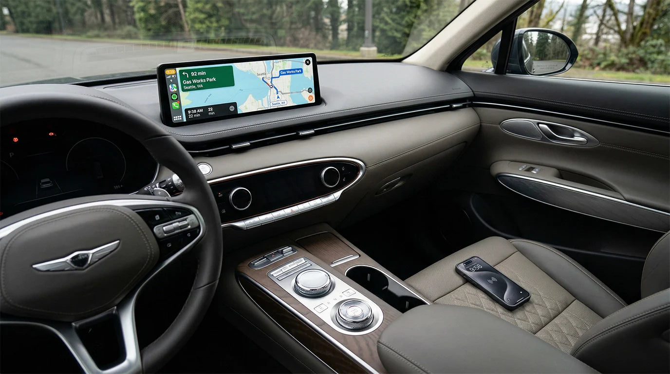 Wireless Apple CarPlay dashboard display in a modern SUV interior with clutter-free center console