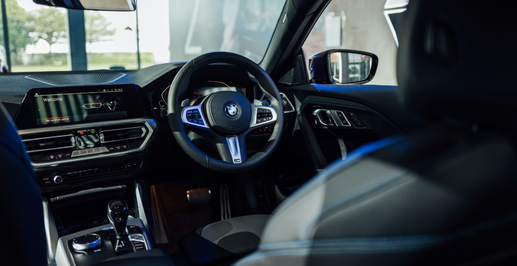 Interior of a BMW car with steering wheel