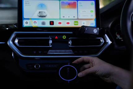 person using a car screen 